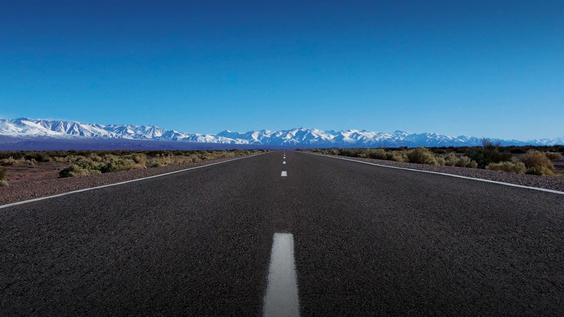 Soft sunrise above desert mountains